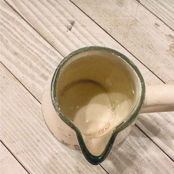 Handcrafted Ceramic Pitcher with Artistic Design - Picture 5 of 7